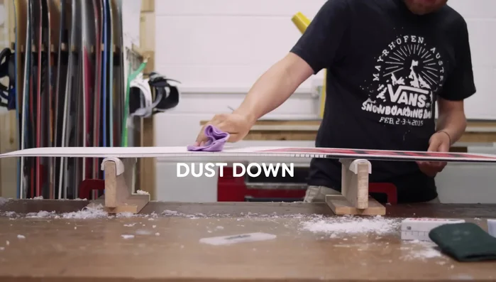 Lightly dust the base with a cloth to remove any remaining wax crumbs.