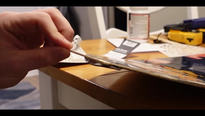 Optional heat application: Apply gentle heat using a hair dryer or heat gun to aid in the drying and bonding process (optional, but recommended).