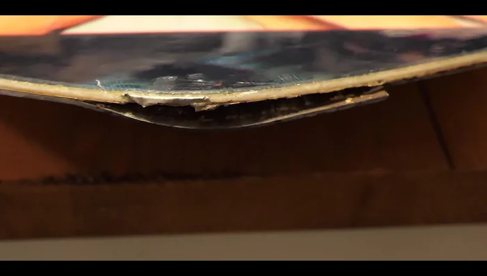 Clean the damaged area: Remove rust and old glue from the metal edge using a wire wheel.