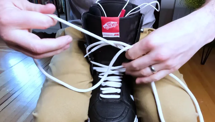 Fasten snowboard boots to preserve their shape.