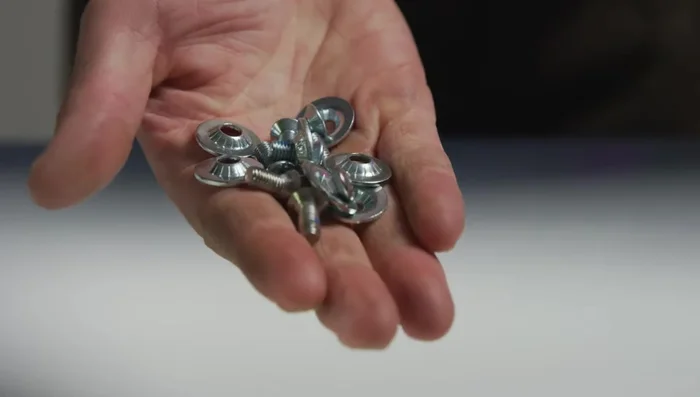 Prepare the mounting hardware (screws and washers).