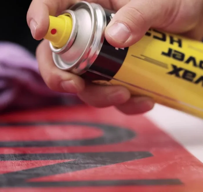 Clean the damaged area with base cleaner and a scour wipe, then dry it with a cloth.