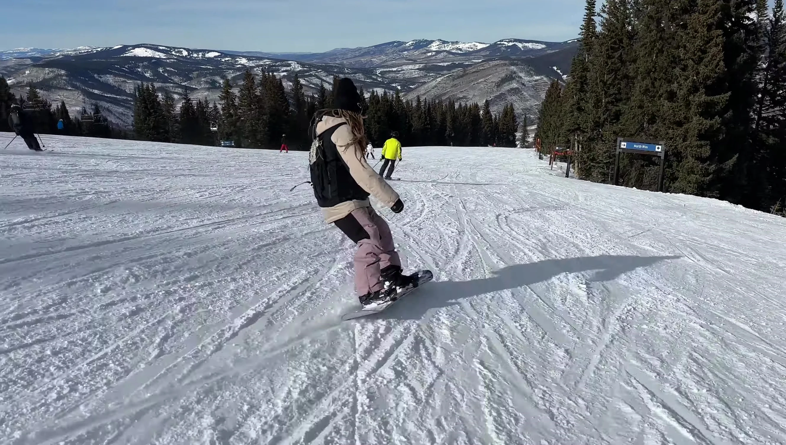 Rider demonstrating smooth turns and control on the Burton Custom