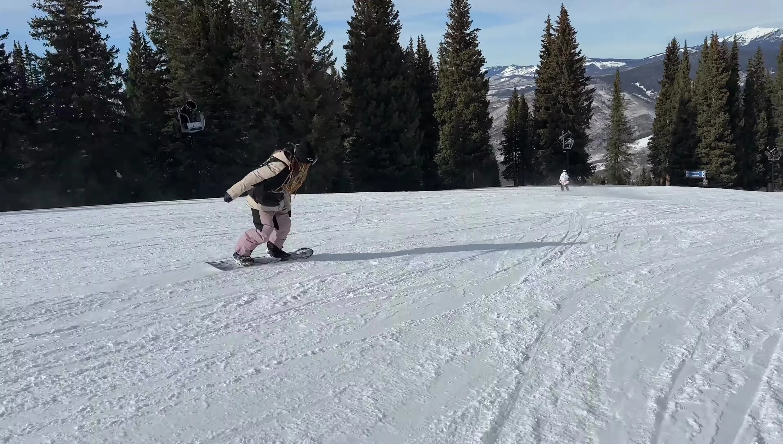 Rider demonstrating a powerful turn on the Burton Custom