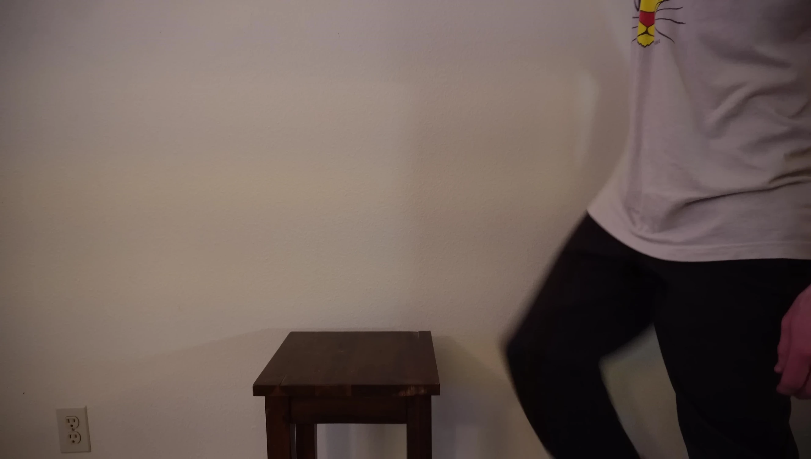 Measuring lower leg to determine snowboard stance width.