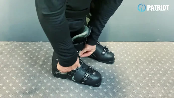 Tighten the lower cuff buckle significantly to lock your heel and secure your ankles.