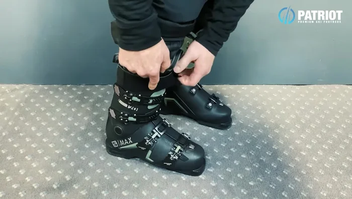 Tighten the power strap to keep the tongue of your liner in contact with your shin as you flex.