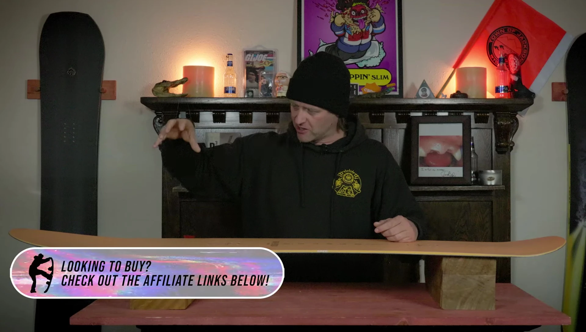 The snowboarder demonstrating a butter.