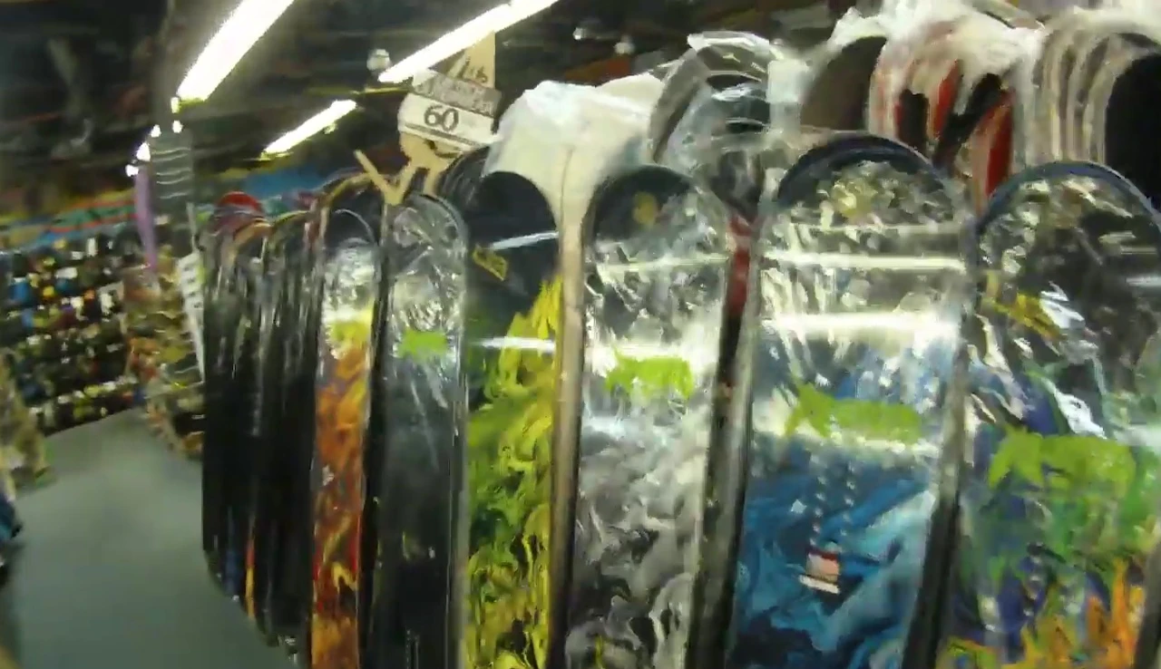 Shot of the snowboard showcasing its flex and overall construction
