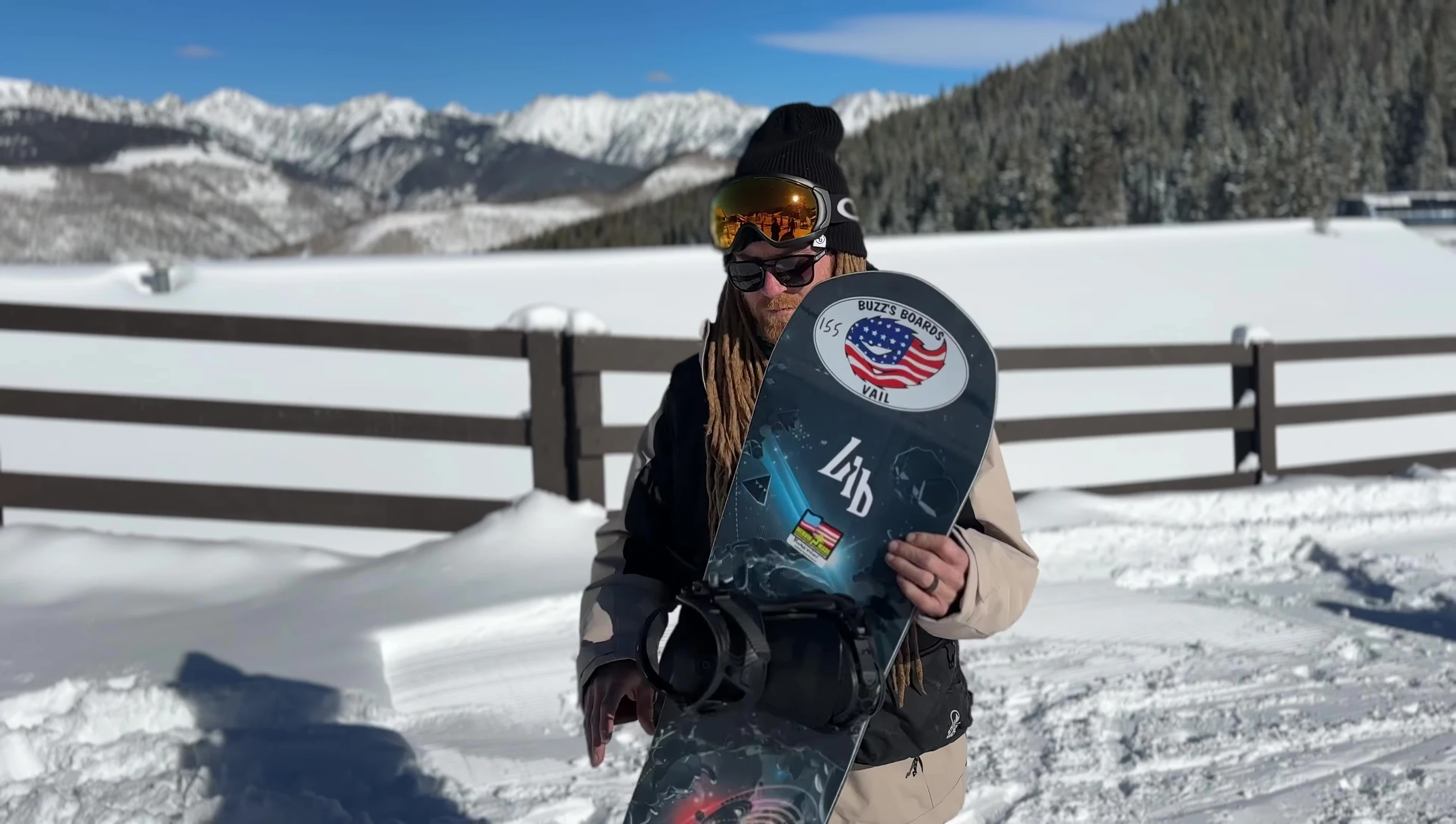 Close-up shot of the snowboard showcasing its soft flex.