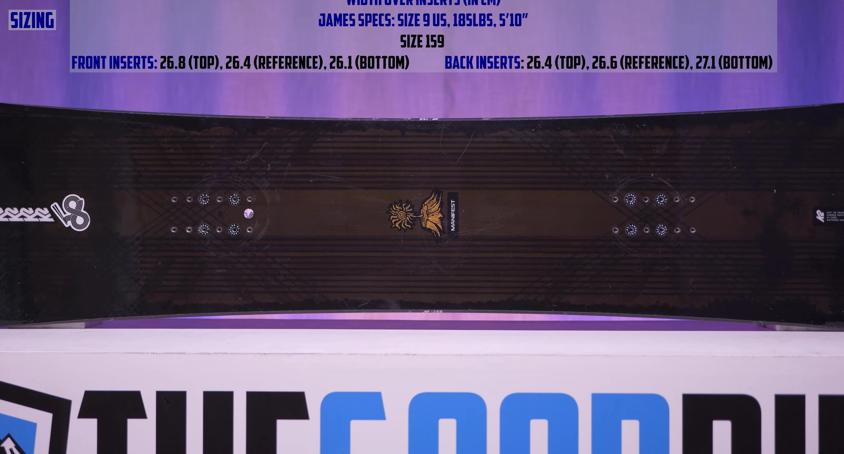 Close-up of the snowboard's dimensions and shape.