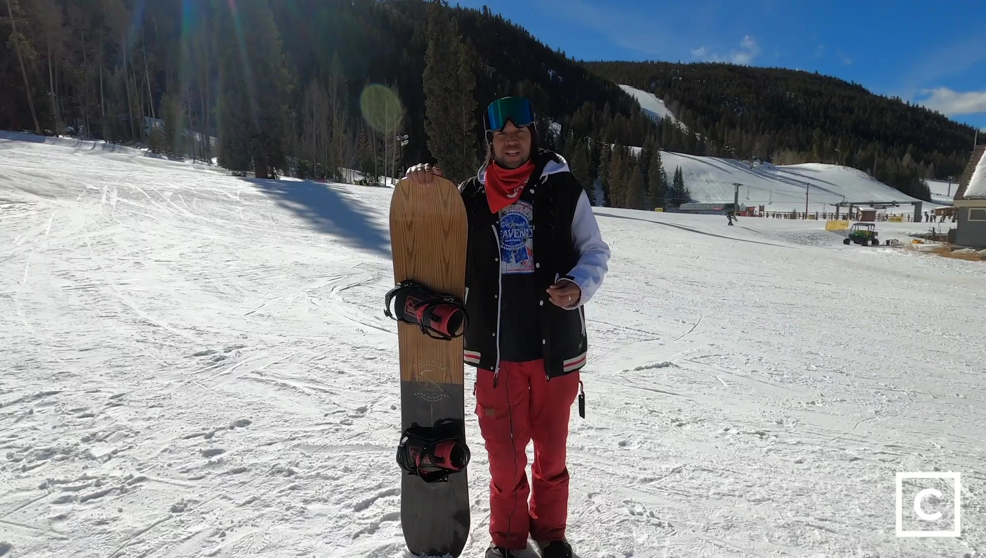 Rider demonstrating the technique needed to load up the board for a maneuver.