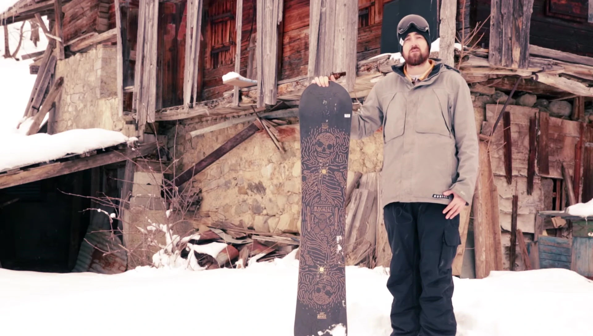 Snowboarder riding in deep powder