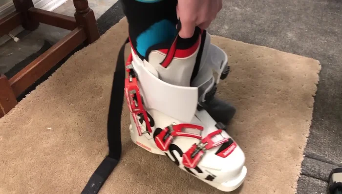 Ensure the tongue is straight and plastic sleeves overlapped.