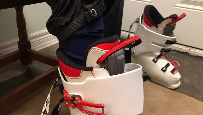 Ensure the tongue is straight and plastic sleeves overlapped.