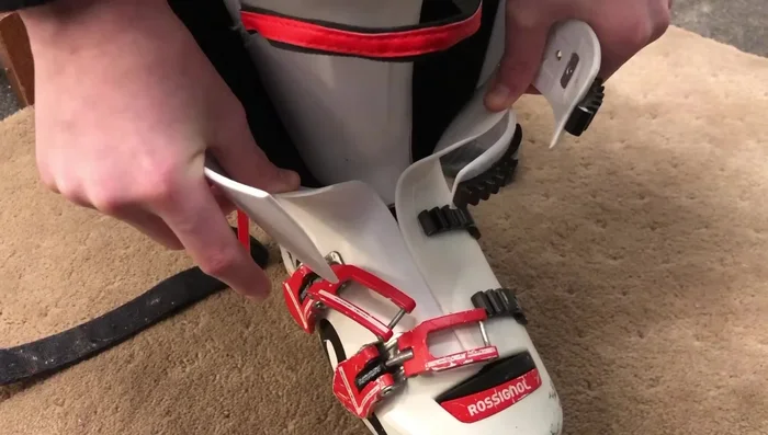 Ensure the tongue is straight and plastic sleeves overlapped.