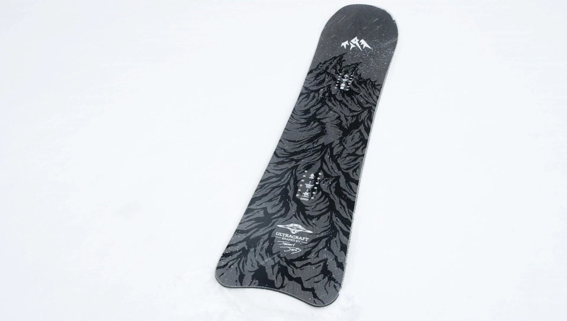 The snowboard showcasing its unique shape
