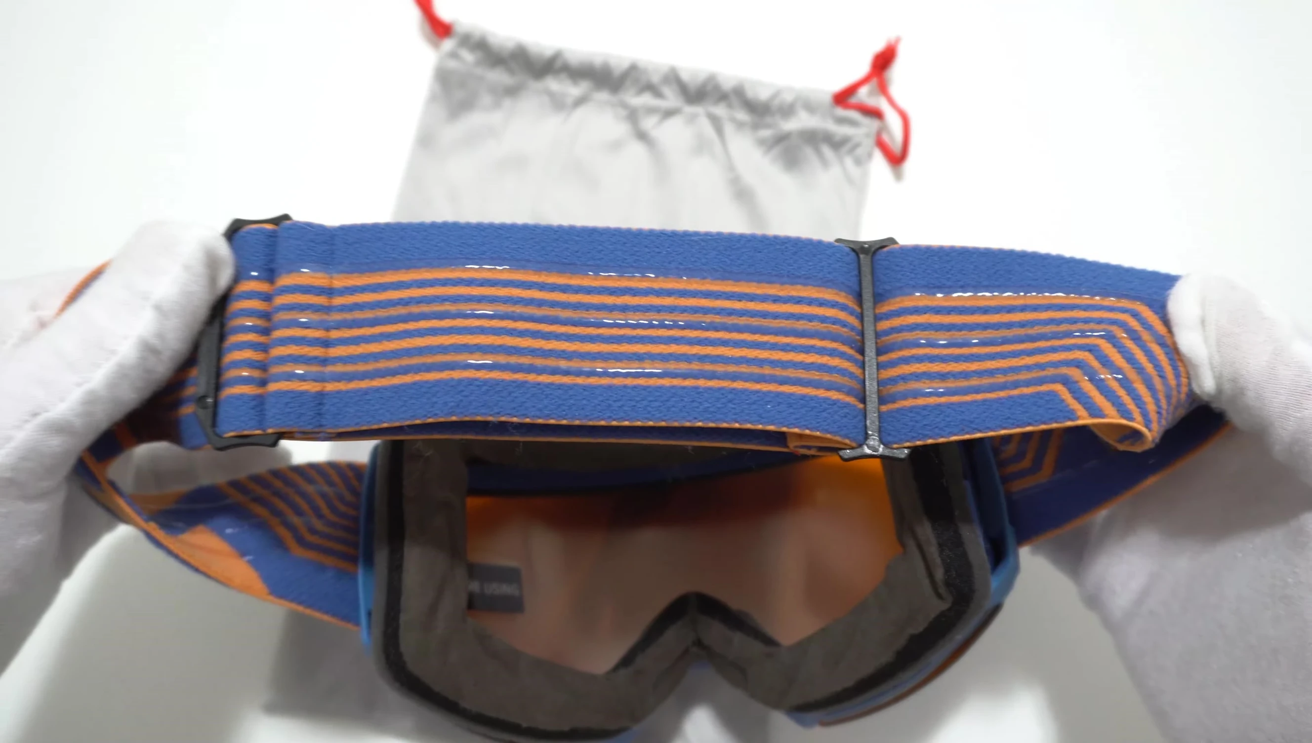 View of the goggles on a head demonstrating the fit and strap placement.