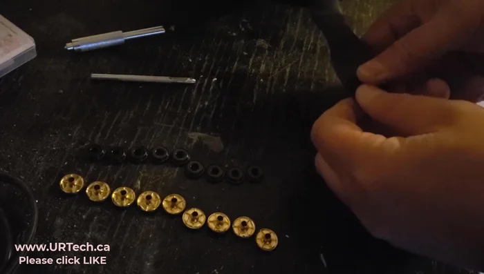 Use the small punch tool and hammer to set the snap securely.