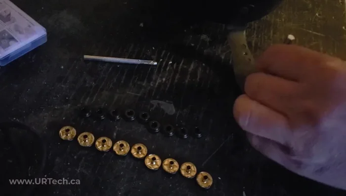 Use the small punch tool and hammer to set the snap securely.