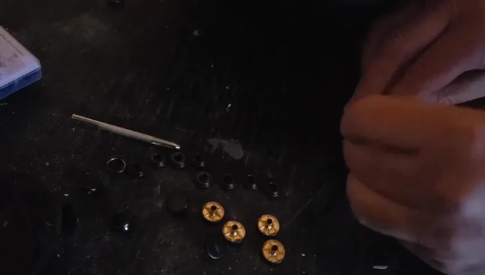 If the initially selected snaps are too small (as happened in the video), use the old snap as a template to drill out the incorrectly placed new one.