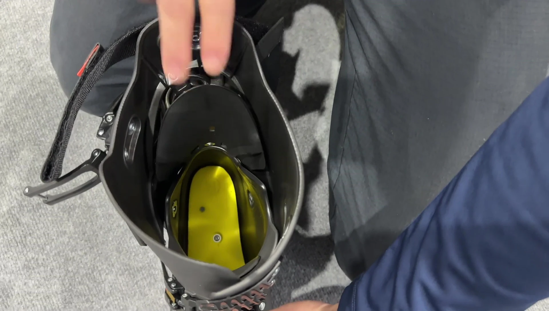 Comparison of traditional four-buckle boot entry vs. Vizion's easier entry.