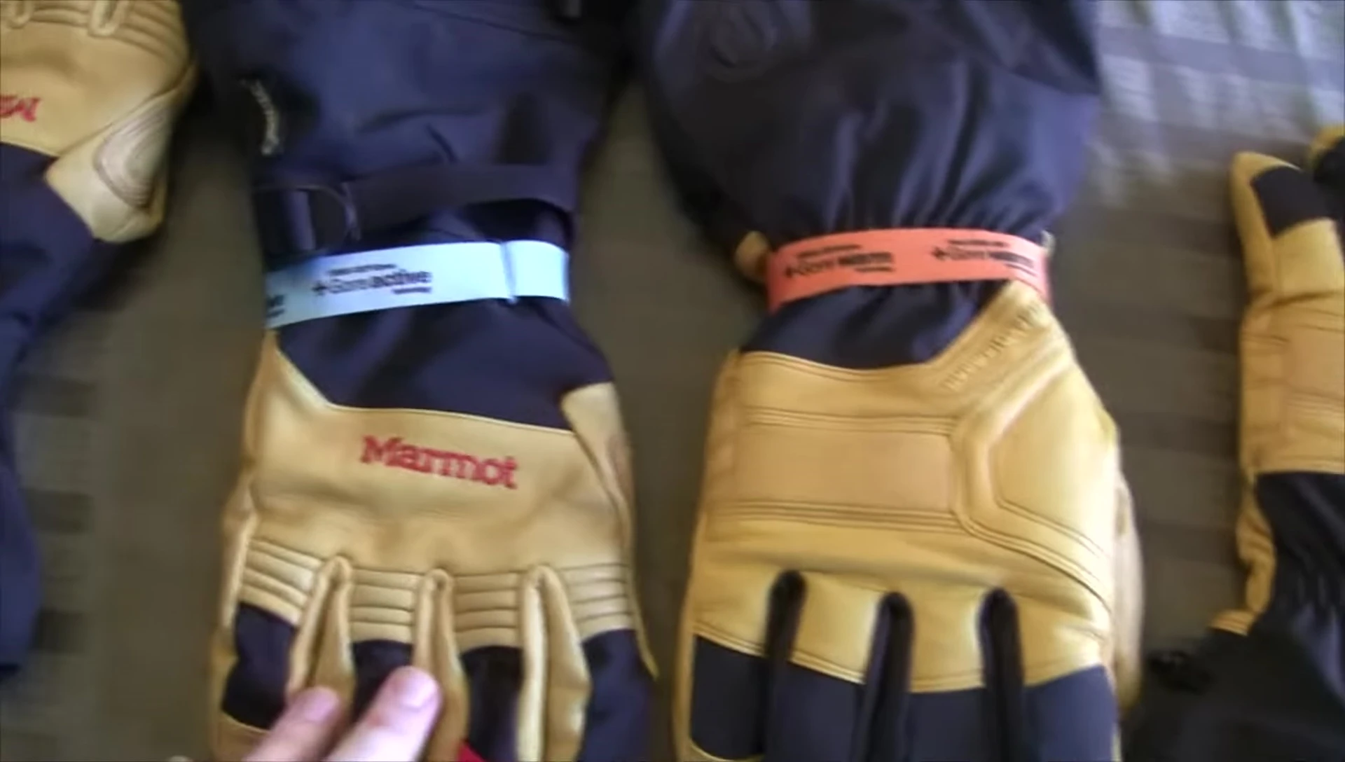 Close-up shot highlighting the Marmot glove's Gore-Tex Active label