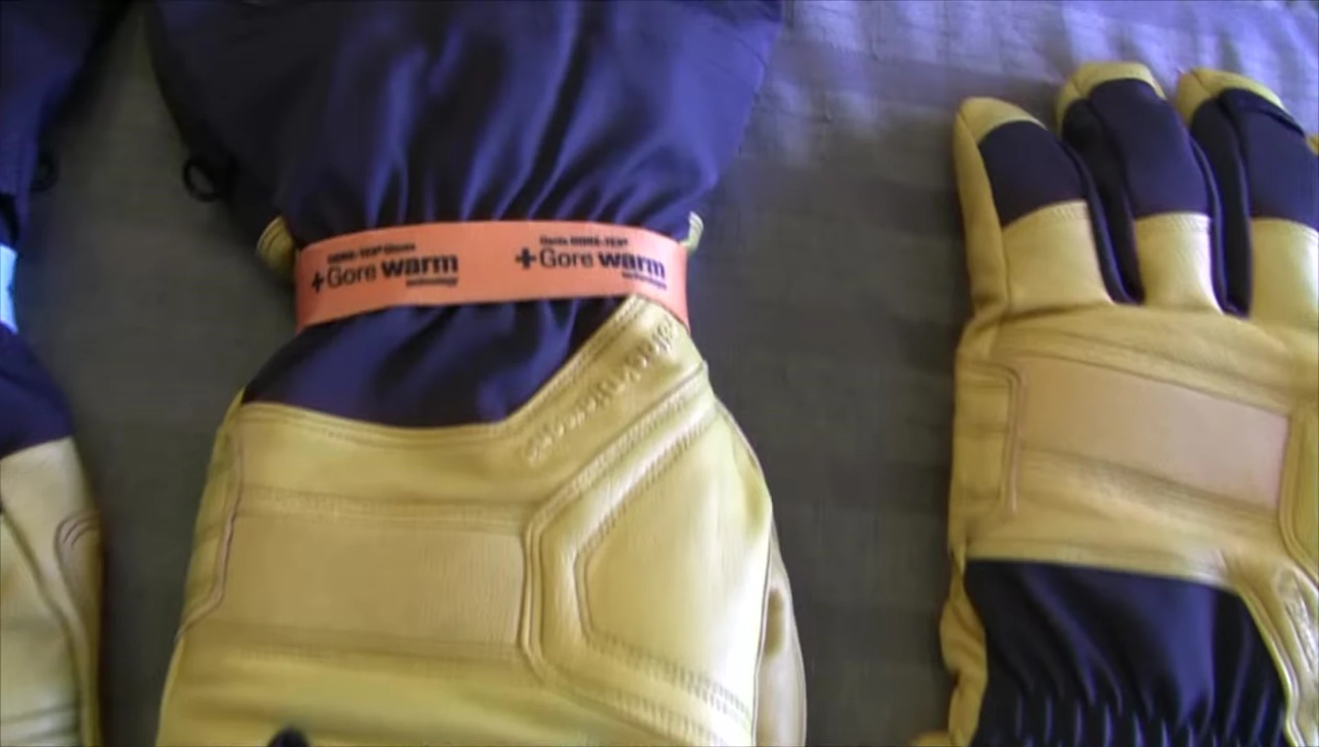 Close-up shot highlighting the Black Diamond glove's Gore-Tex Warm label