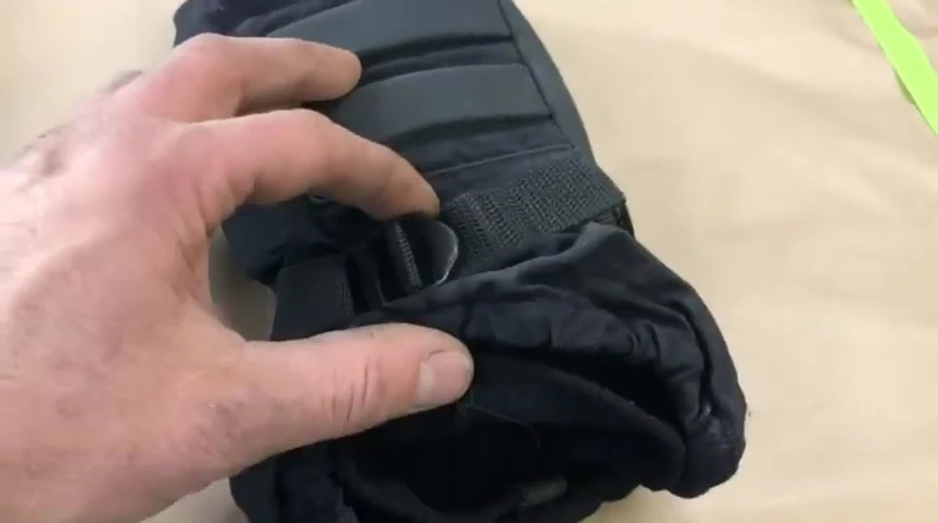 Image showing minor bunching at the glove cuff.