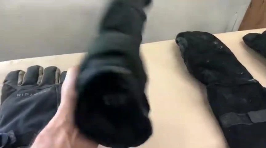 Close-up of Ripzone gloves showing wear and tear.