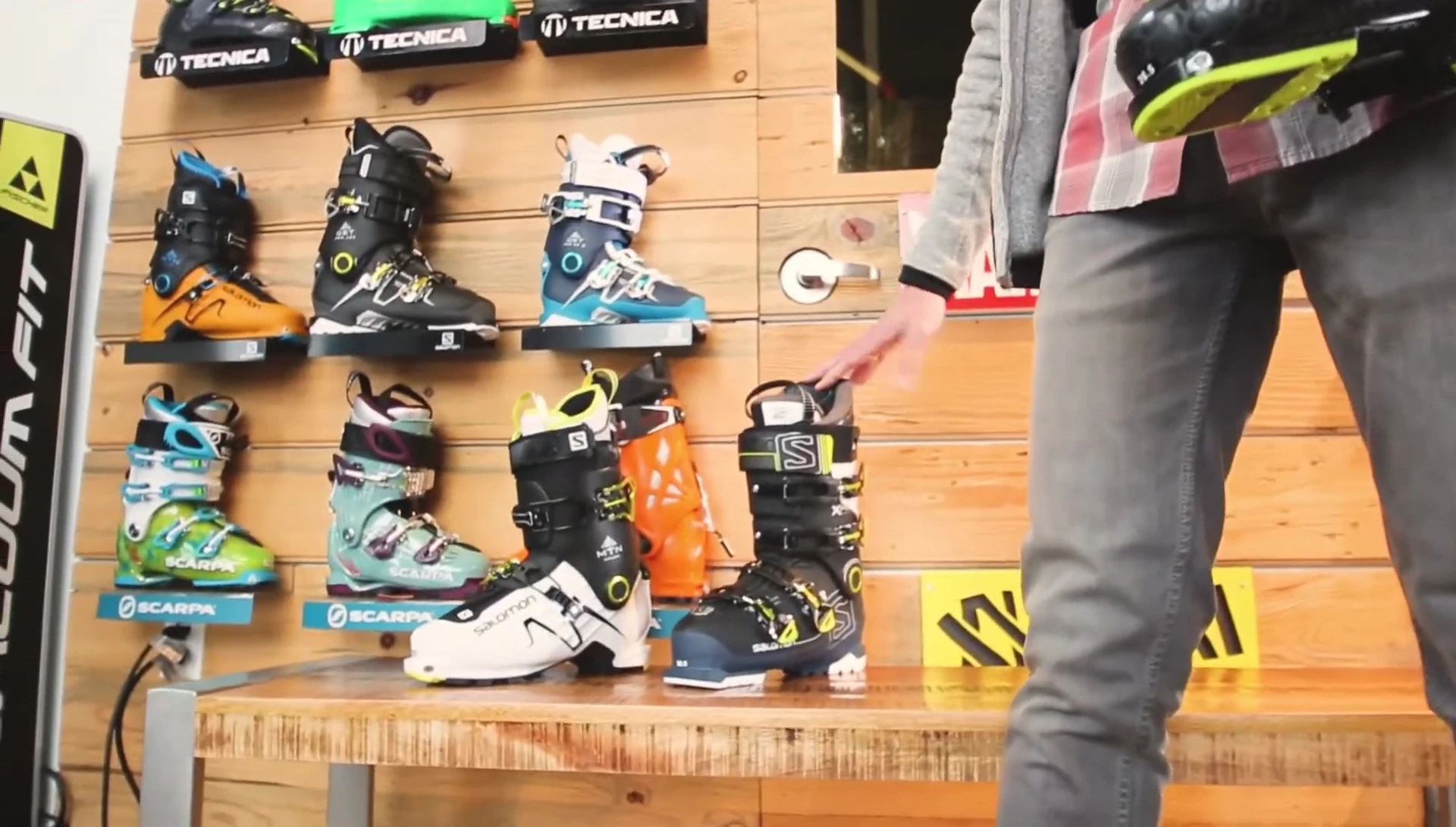 Comparison shot showcasing the weight difference between the Cochise 120 and other ski boot types.