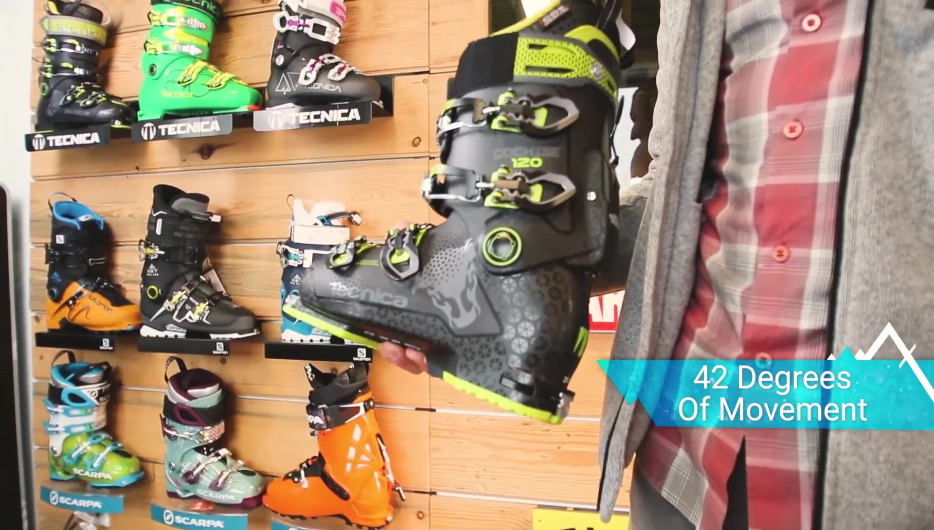 The reviewer showcasing the boot's flexibility in hike mode.