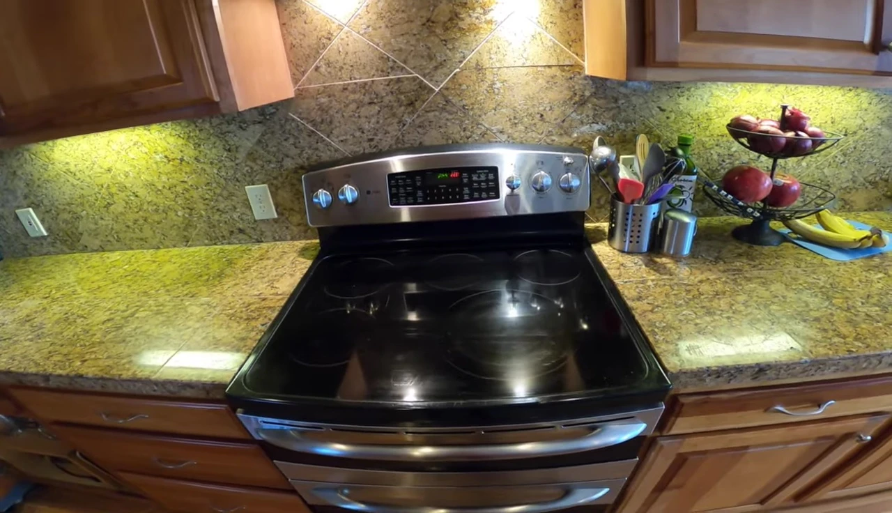 Removing the baking sheet with heated liners from the oven.