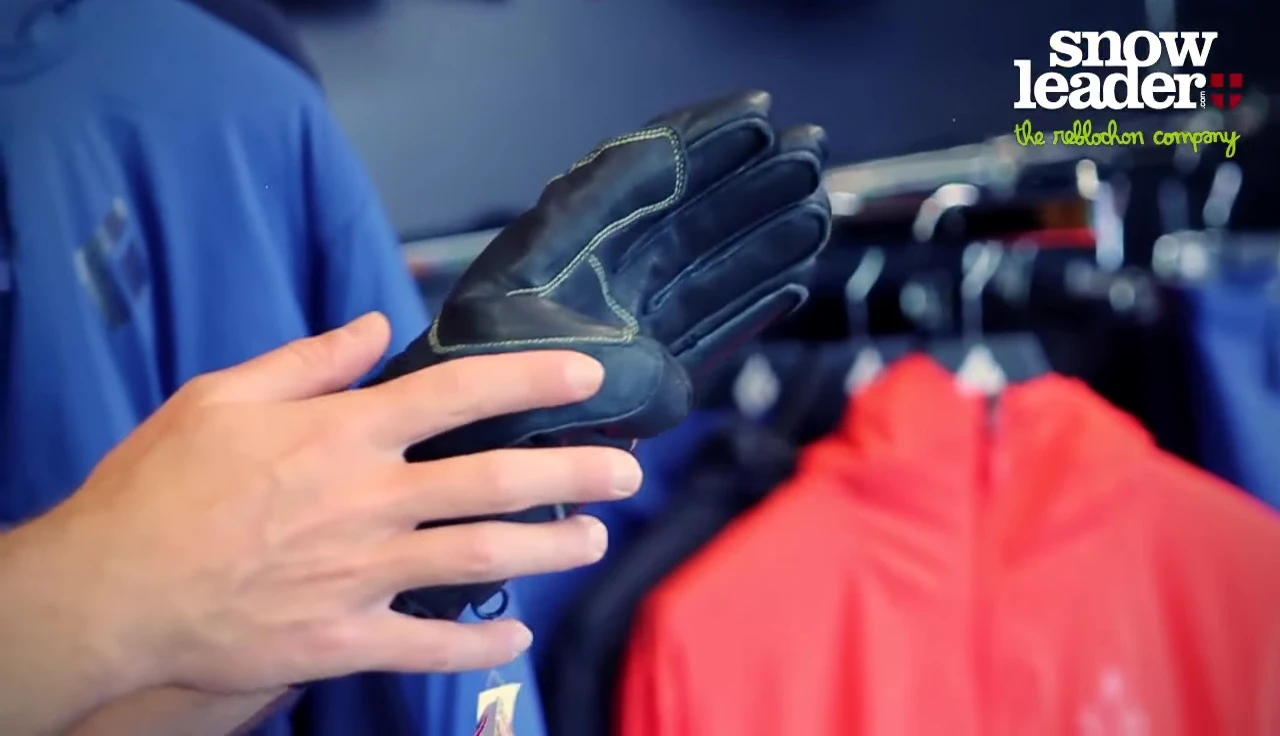Goggle wipe patch on the thumb