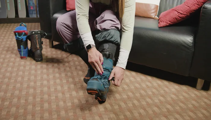 Work your way up, applying even pressure between the two most important buckles.