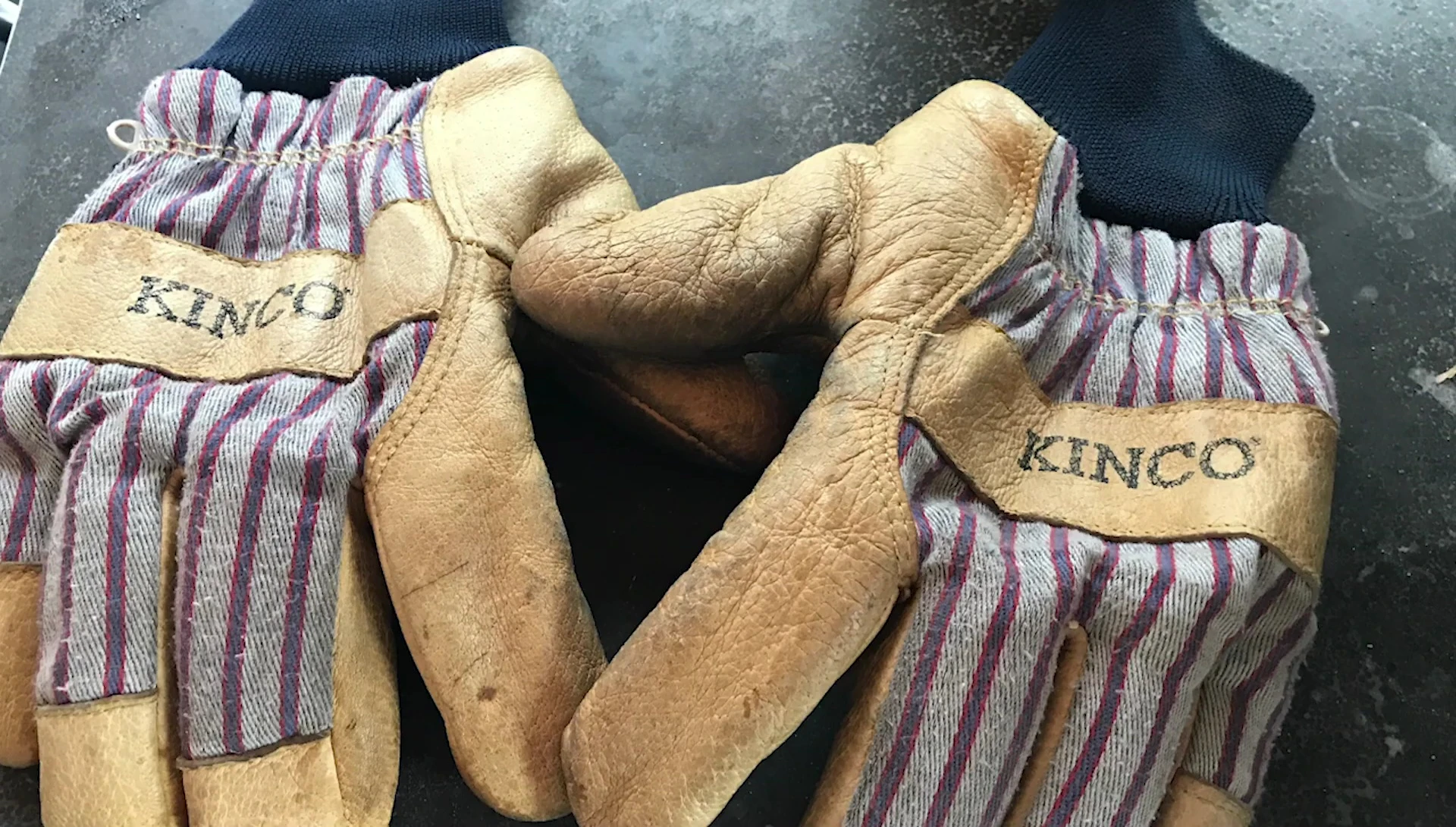 Shot showing the gloves from a slightly different angle, focusing on the knit wrist.