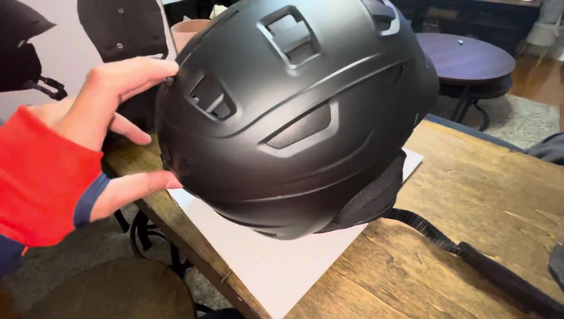 Close-up of the adjustment dial on the back of the helmet.