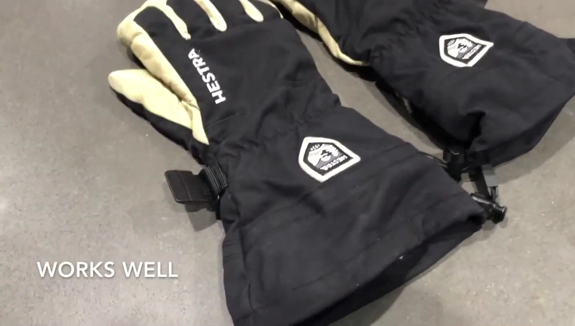 Close-up shot showcasing the long cuff design of the gloves.