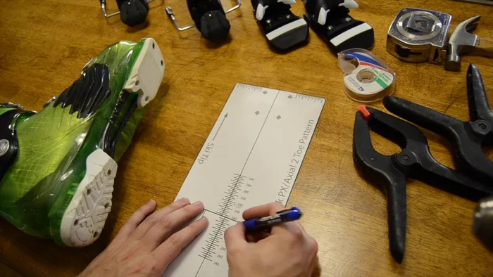 Carefully tape the templates together, ensuring they are straight.