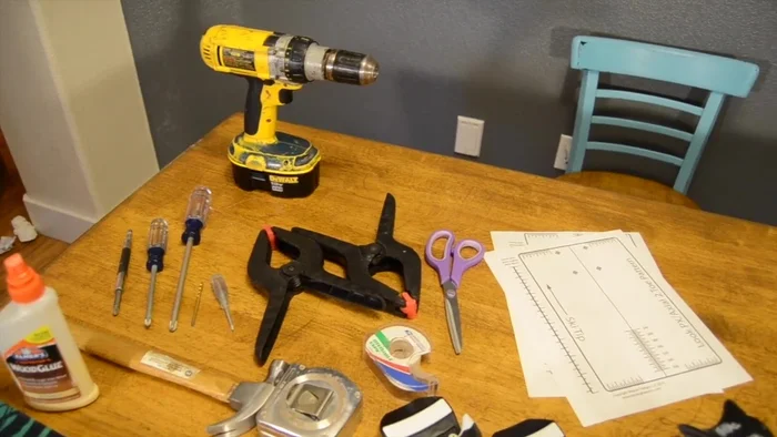 Carefully tape the templates together, ensuring they are straight.