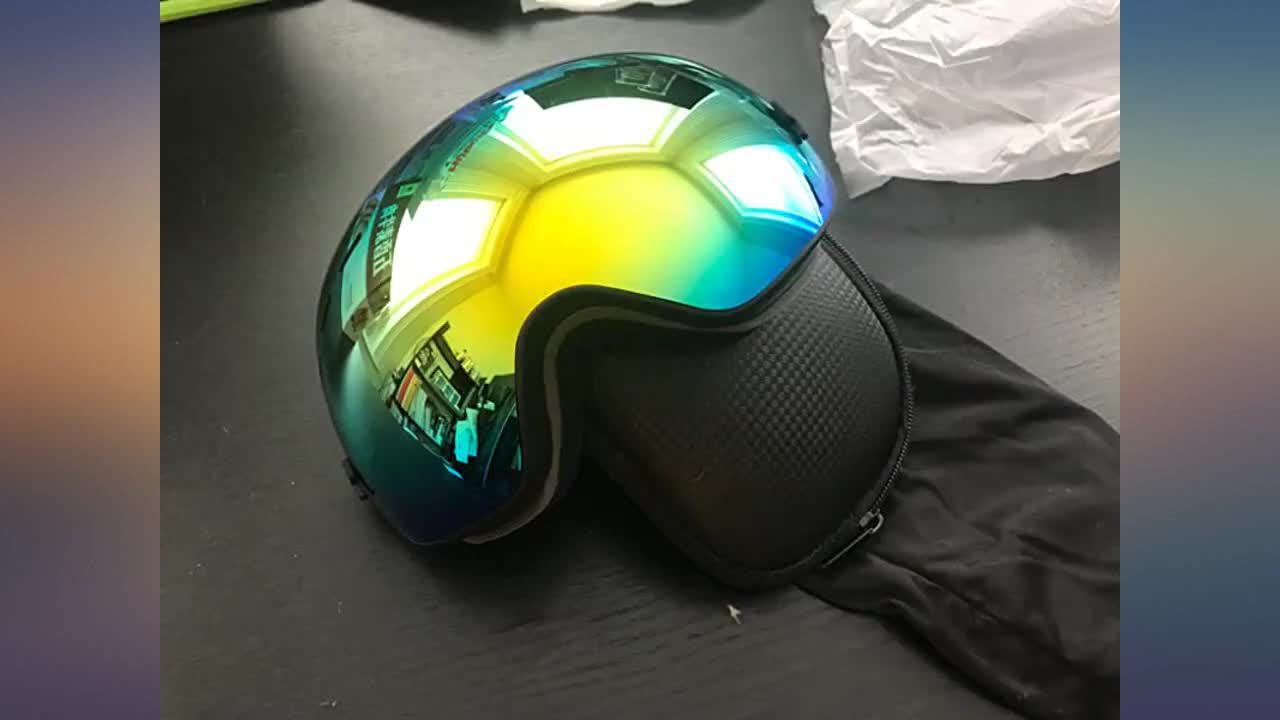 Son wearing the goggles, receiving compliments