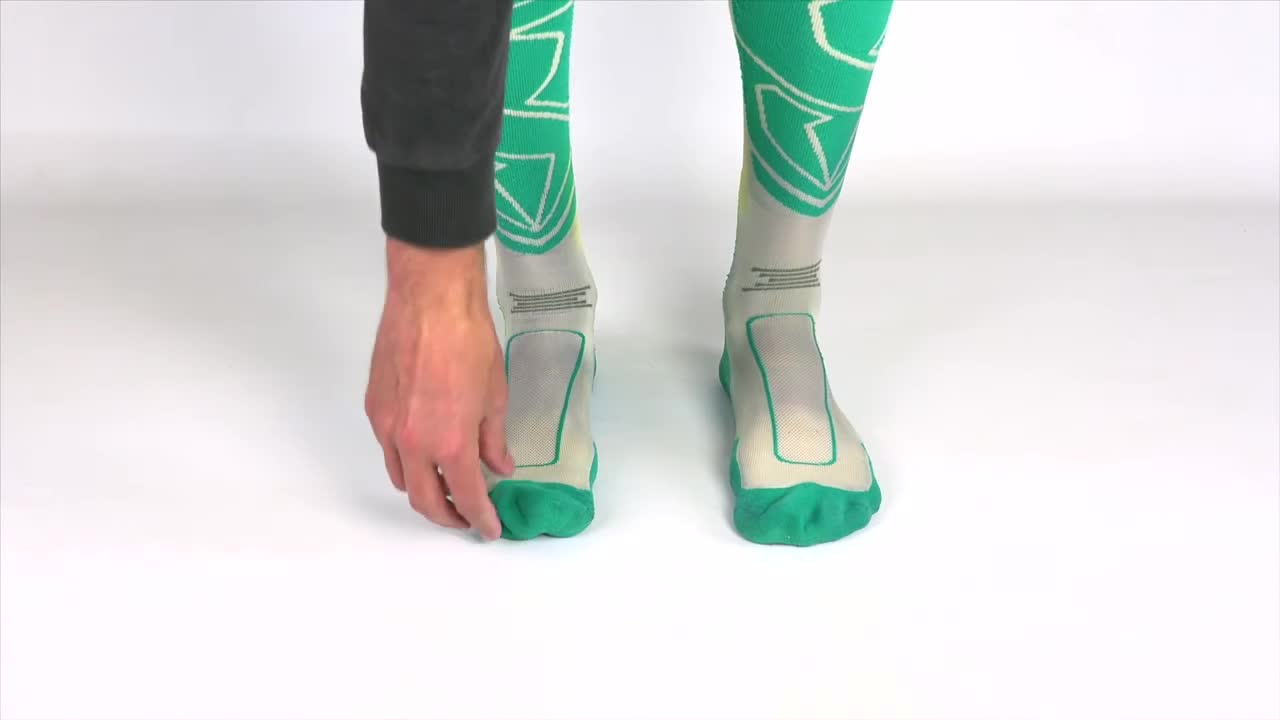 Close-up of a person checking the fit of their socks.