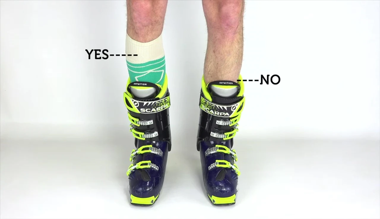 Image showing the ideal sock length in relation to a boot.