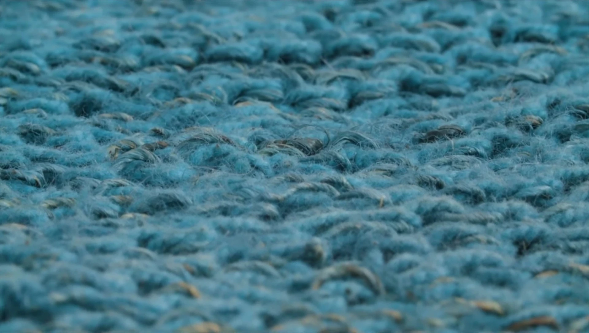 Close-up of coarse wool fibers under a microscope