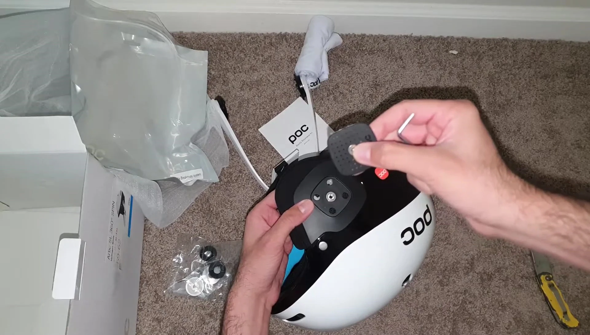Close up shot highlighting the instruction to keep the screw safe.