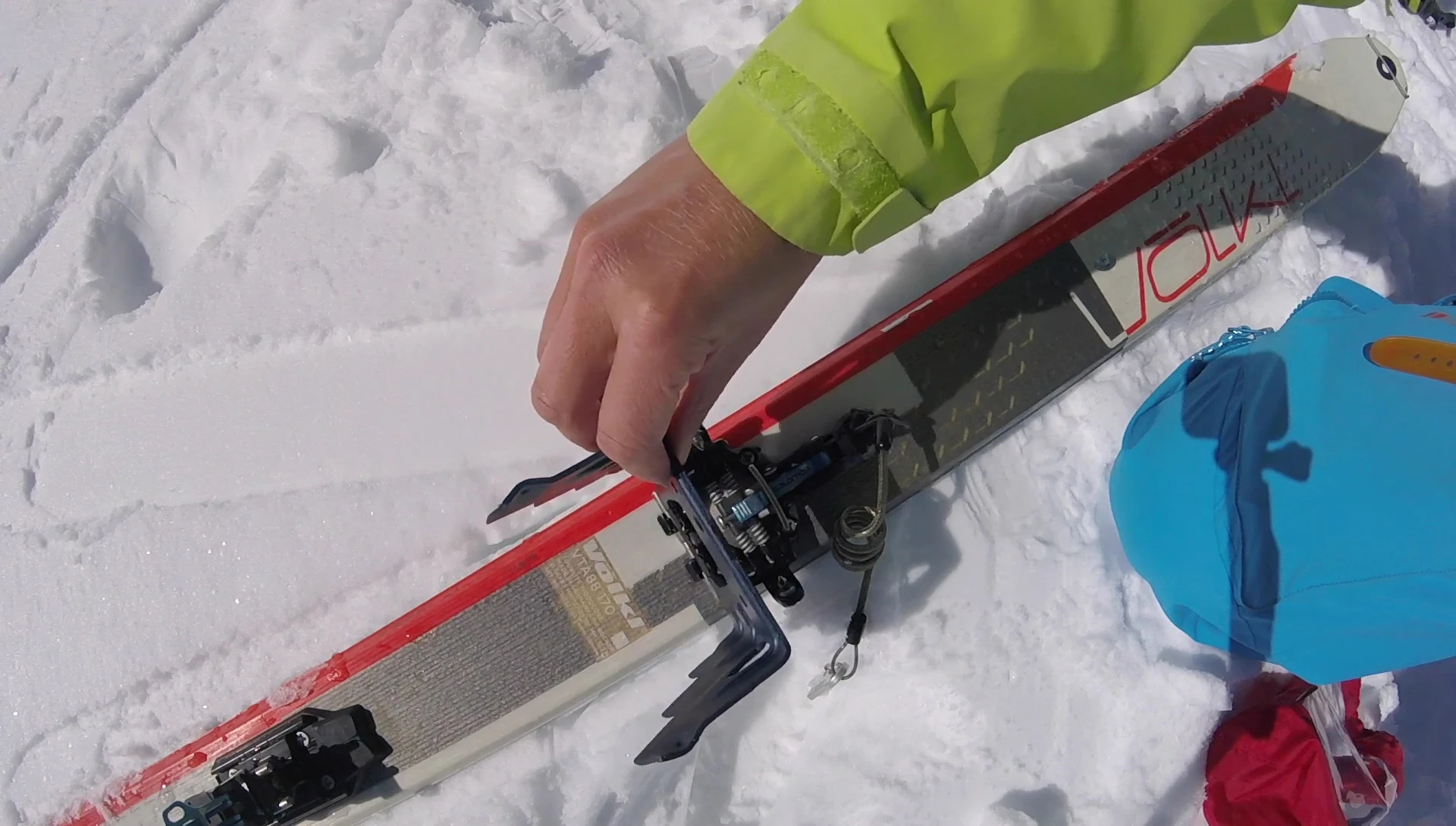 Demonstrating the easy removal of the crampon