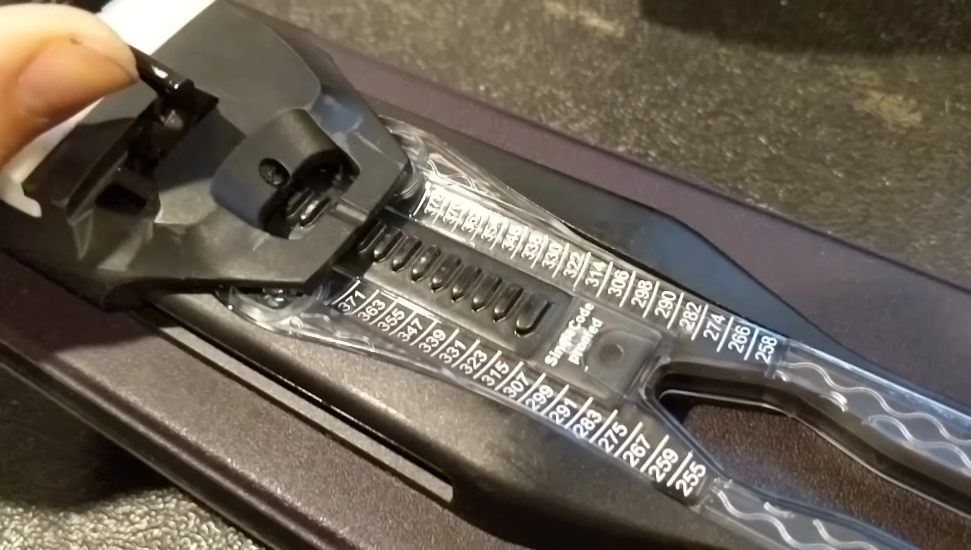 Locating the corresponding boot length mark on the binding system.
