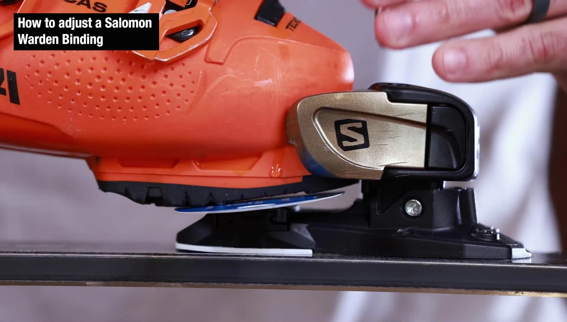 Location of the screw used to adjust the toe piece height.
