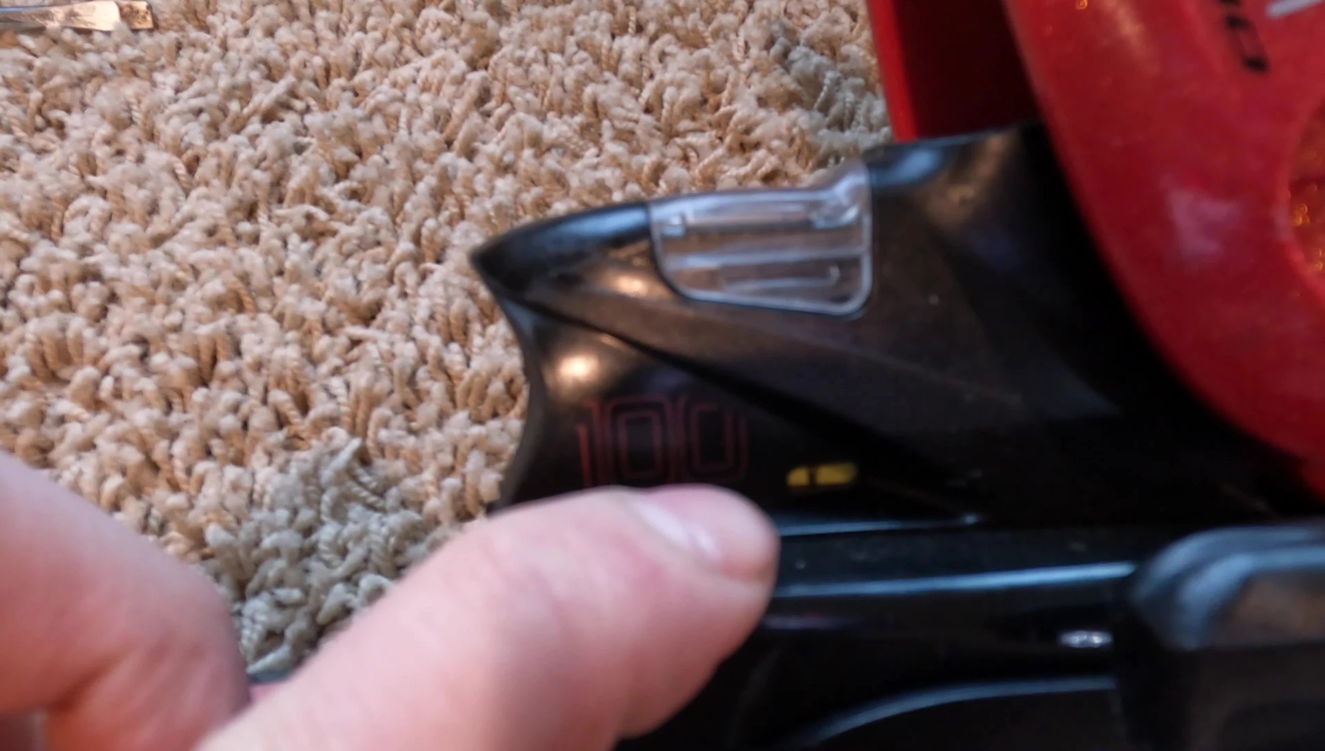 The yellow window on the heel piece showing the black line indicating forward pressure.