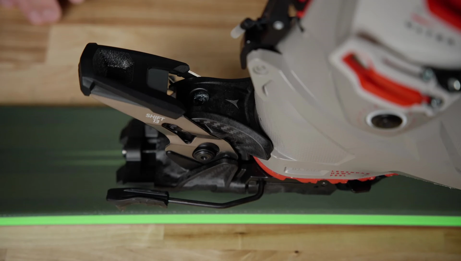 Adjusting the DIN setting on the heel piece with a screwdriver.